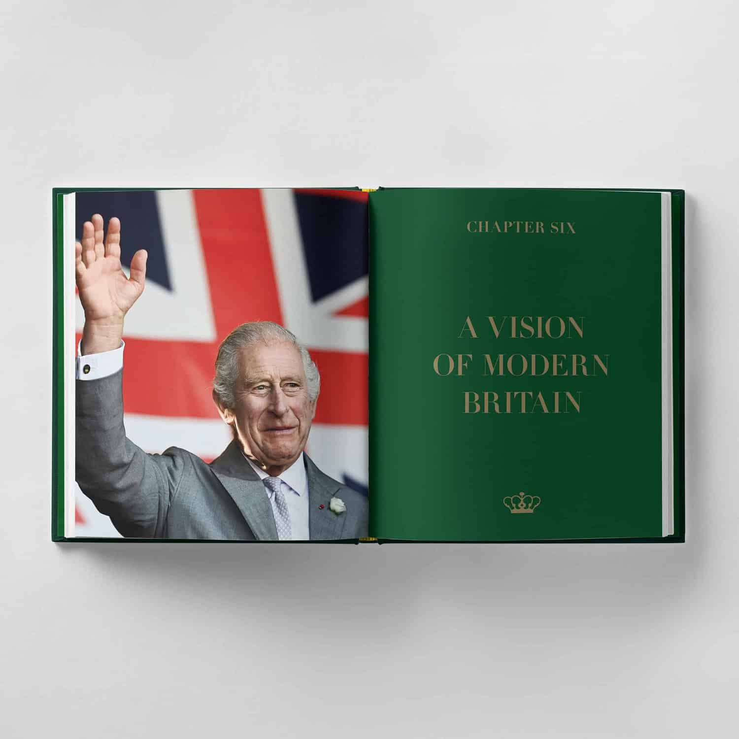 Open book displaying a man waving on the left and the text "A Vision of Modern Britain" on the right, set against a backdrop of the Union Jack flag, subtly alluding to King Charles III's influence.