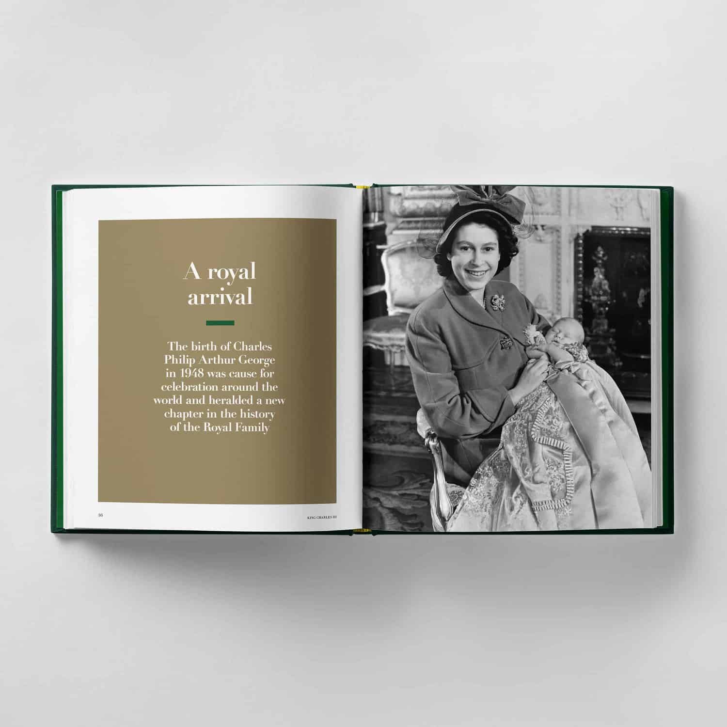 An open book reveals a page detailing the 1948 birth of Charles Philip Arthur George, now known as King Charles III, alongside a black and white photograph of a woman cradling him as an infant.