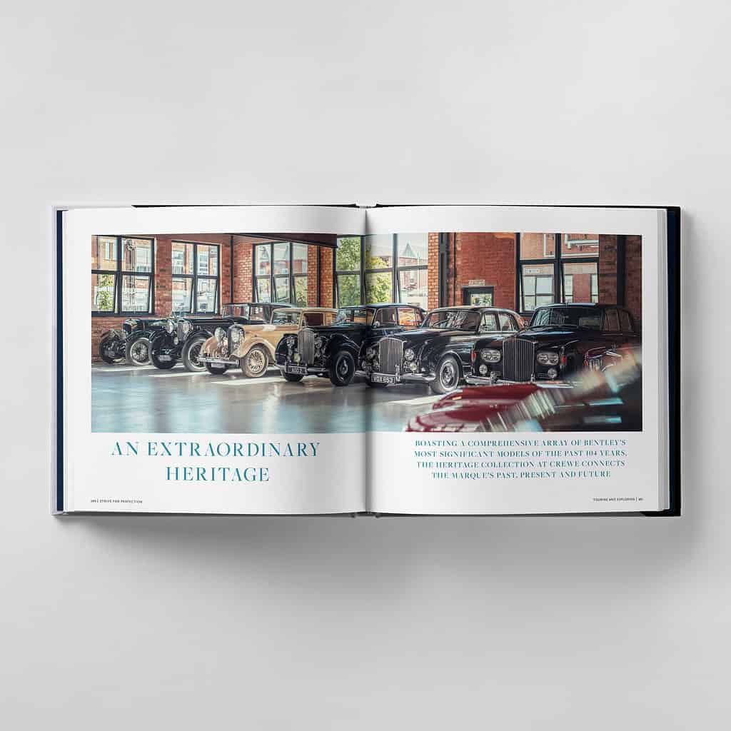 Open book displaying vintage cars in a showroom with text reading "An Extraordinary Heritage." Strive for perfection in every detail.