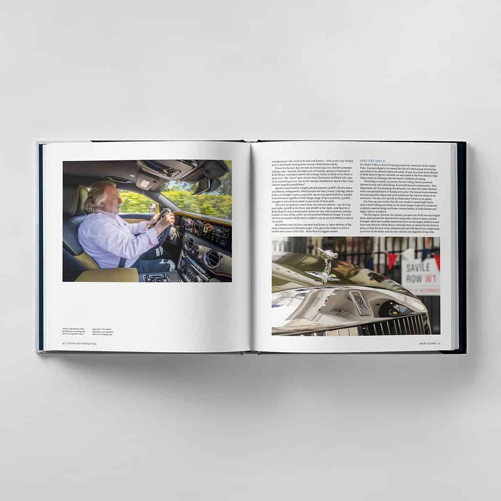 Open book showing a man striving for perfection as he drives a car on the left page, with a close-up of a gleaming car hood ornament alongside text on the right page.