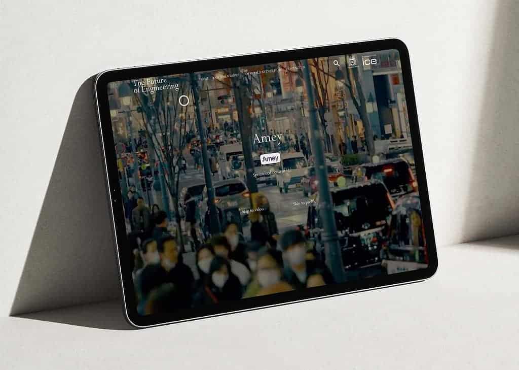 A tablet showcases a bustling city street scene with masked pedestrians, highlighting the essence of smart city innovation.