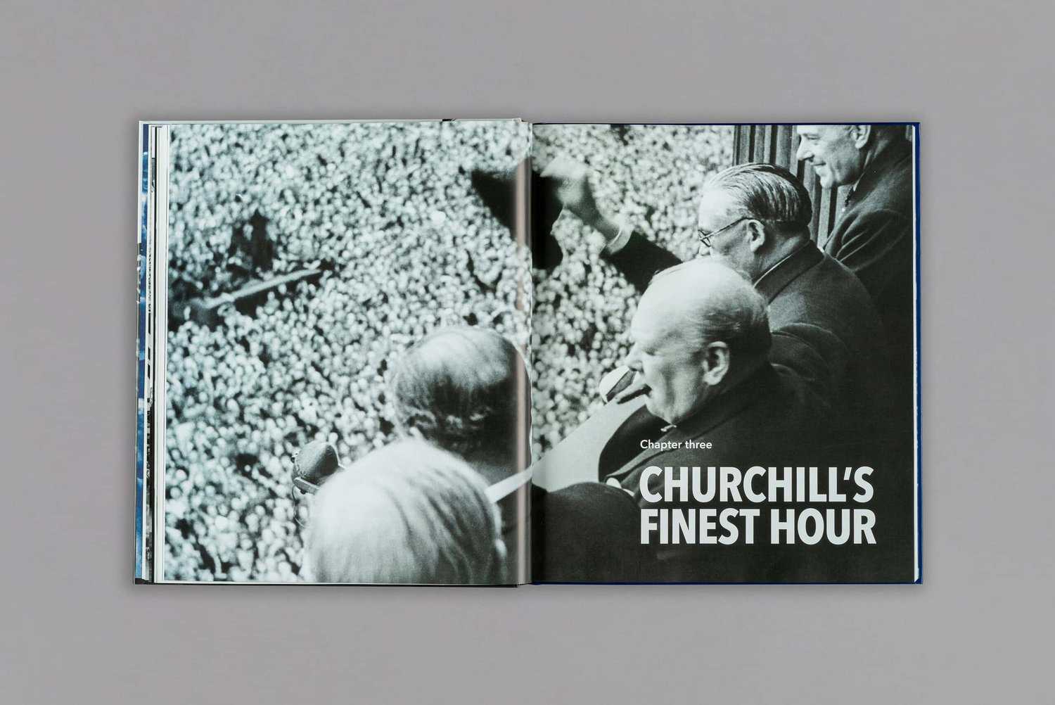 Open book showing a black-and-white photo of Winston Churchill waving to a crowd. Text reads "Chapter three: CHURCHILL'S FINEST HOUR.
